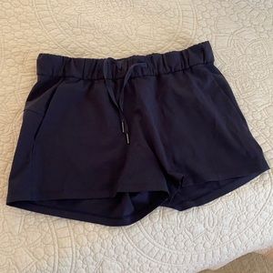 Lululemon Navy On the Fly Shorts